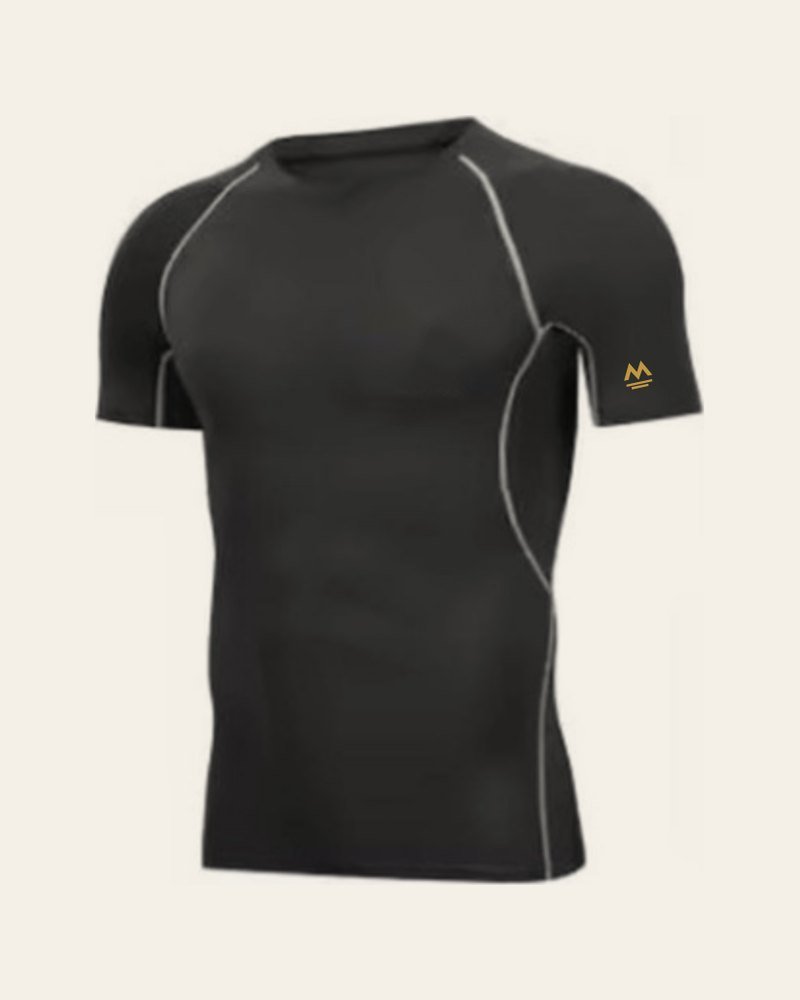 The Performance Tee, black with a small gold Stanmore mark